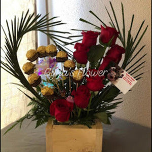 Heart shaped Greenery with red Roses